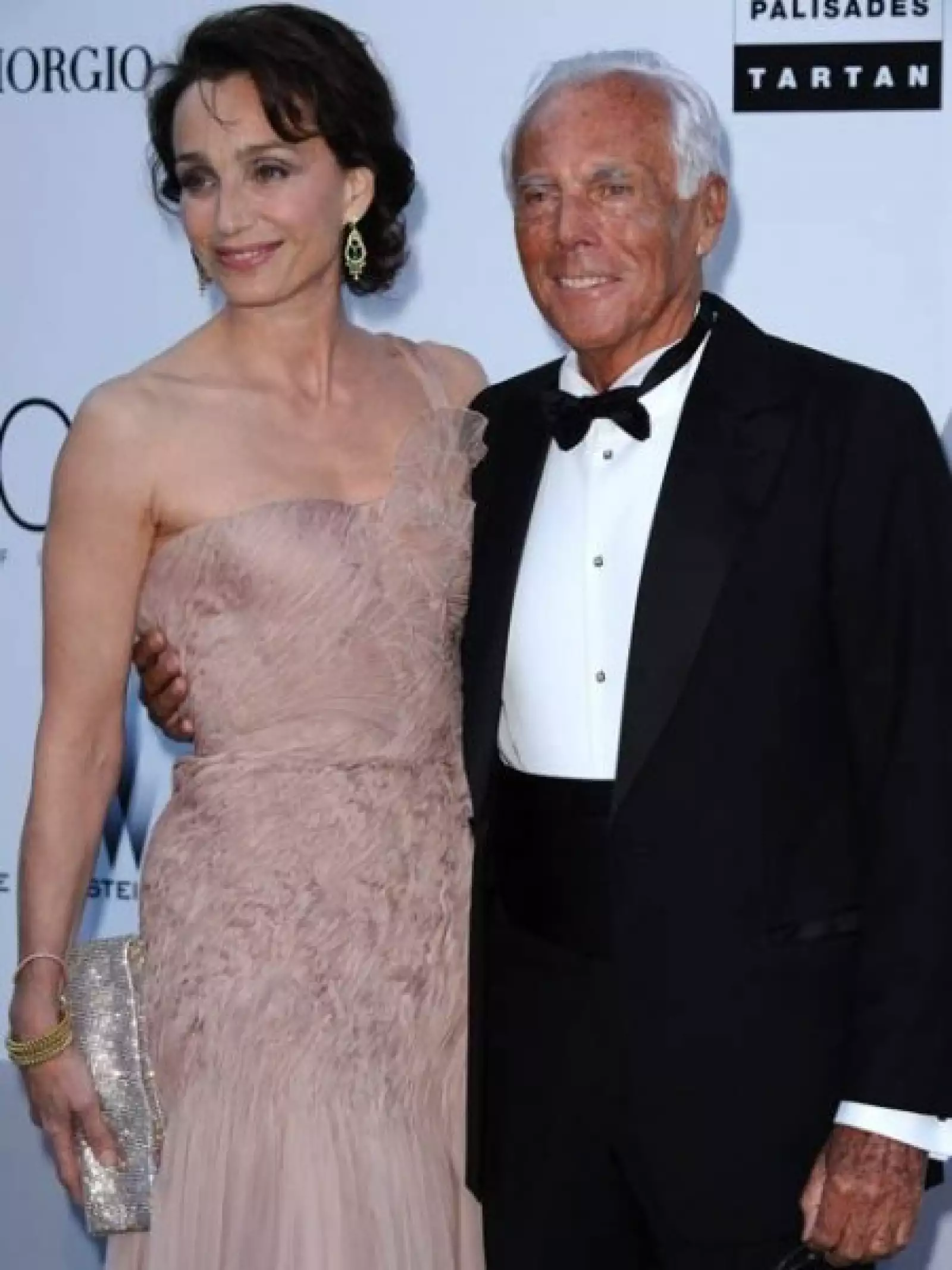 Giorgio Armani y Kristin Scott Thomas