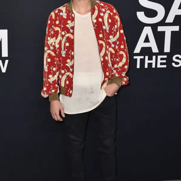Justin Bieber asistió al desfile, donde se codeó con varios famosos, entre ellos Sylvester Stallone, Beck y Lenny Kravitz.