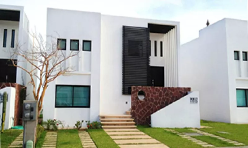 Homex reportó pérdidas netas por 10,055  mdp al cierre de junio pasado. (Foto: tomada de homex.com)