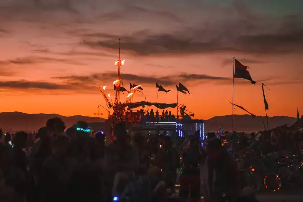 People,Dancing,At,The,Sunset,Enjoying,The,Music,Festival,And