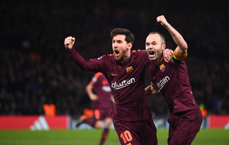 Andrés Iniesta con Lionel Messi