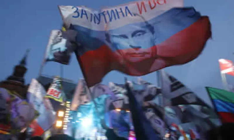 Putin, que ganó con el 64% de los votos, apuntaló a su base con generosas promesas en sectores diversos, desde los misiles nucleares hasta los jardines de infantes. (Foto: AP)