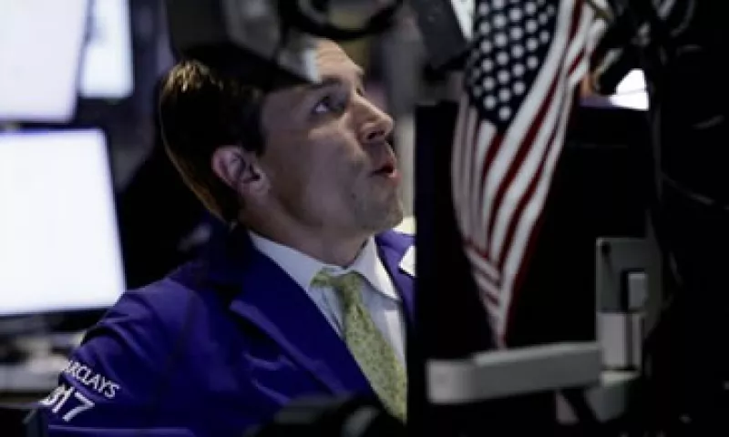 Las acciones también se ven presionadas por un reporte del NYT sobre las pérdidas de JPMorgan en una fallida cobertura. (Foto: AP)