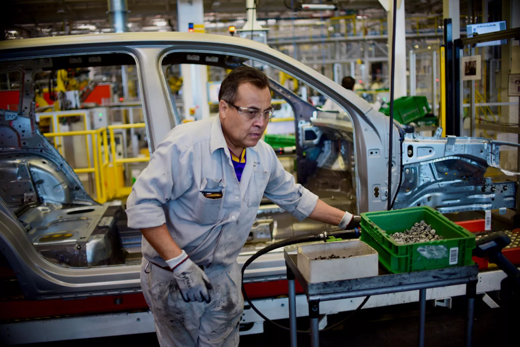 (Trabajador de planta automotriz)