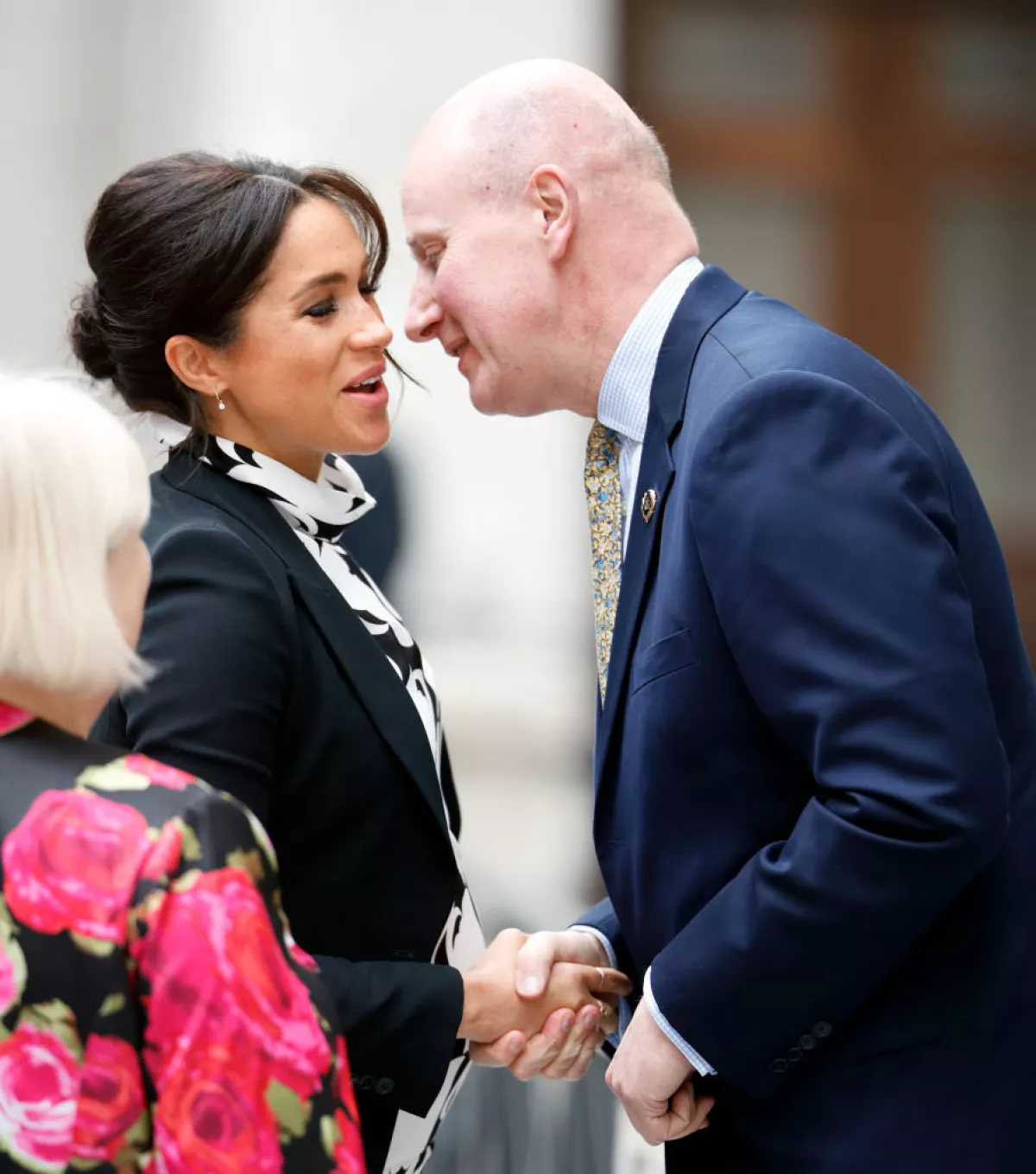 Meghan, duquesa de Sussex, y lord Christopher Geidt