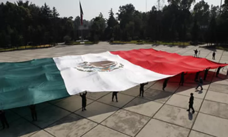 El informe del banco alerta sobre riesgos en los que las autoridades de México se deben concentrar, como el estrecho vínculo con EU. (Foto: AP)