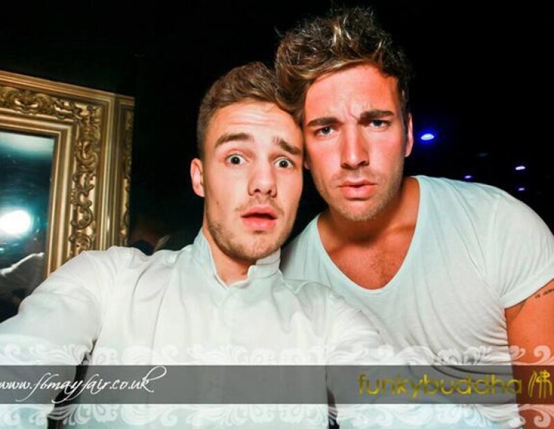 Liam con su amigo Andy Samuel.
