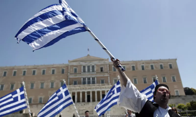 Griegos protestaron frente a la sede del Parlamento debido a la aprobación de la reforma. (Foto: AP)