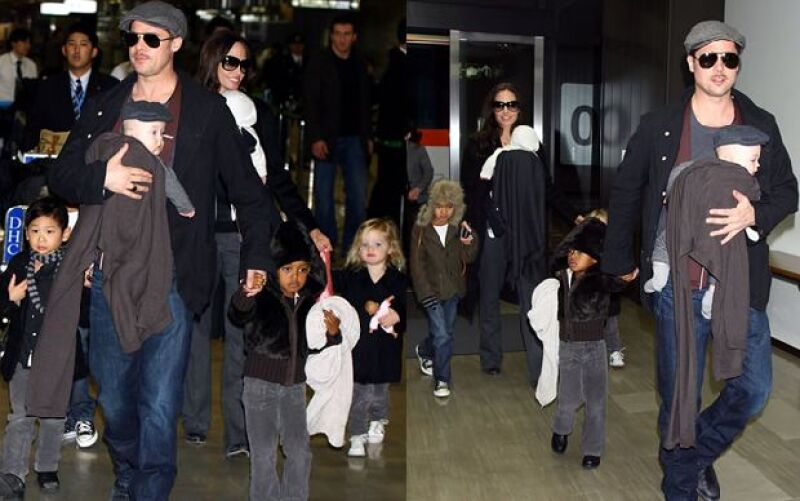 Los actores viajaron para presentar la cinta El Curioso Caso de Benjamin Button; la pareja fue captada en el aeropuerto de Narita, cerca de Tokio, con sus seis niños.