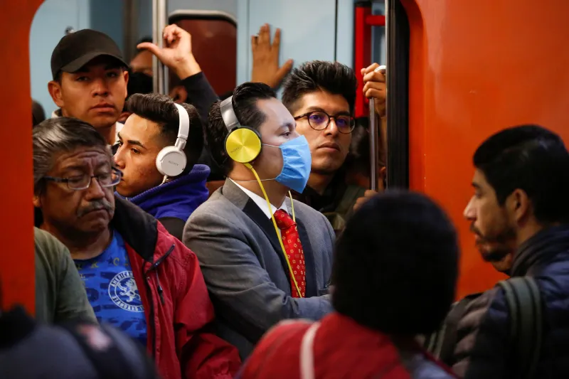 A man wears a protective face mask in the Pantitlan metro station as Mexico's government is seeking to minimize public disruption in its response to the coronavirus disease (COVID-19), in Mexico City