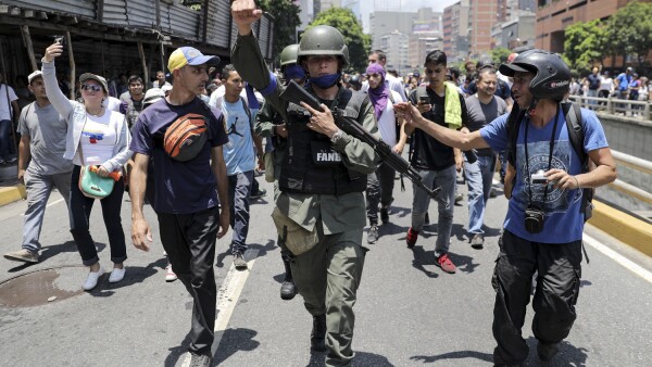 Venezuelan National Guard (GNB) members join protesters in Caracas