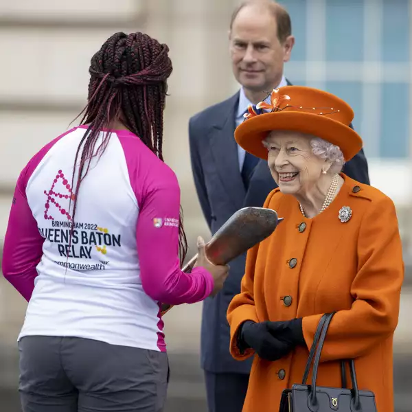 The Queen's Baton Relay At Buckingham Palace