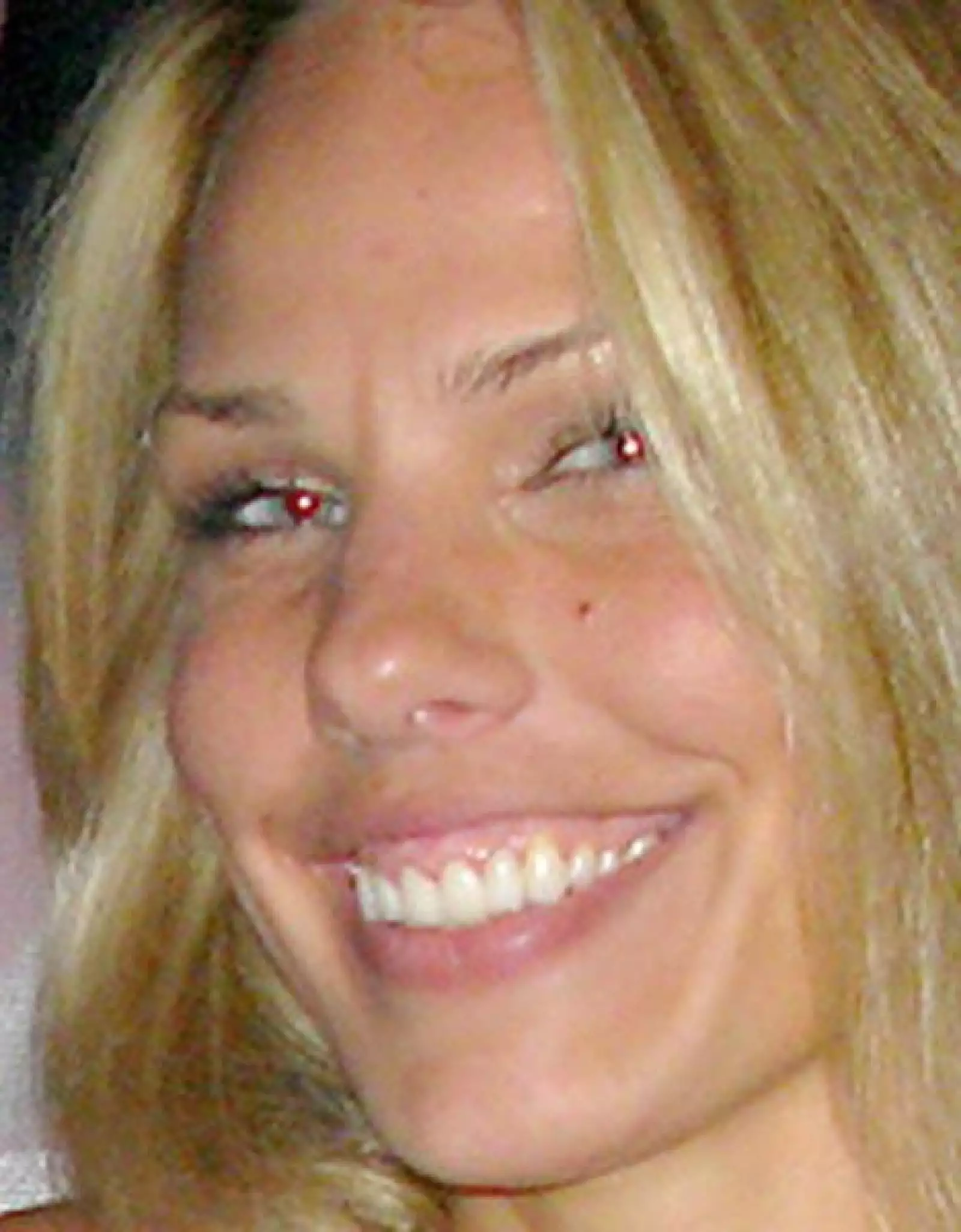 Es propietaria de un club en Manhattan, se rumora que se reunía con Woods en hoteles donde el golfista competía.