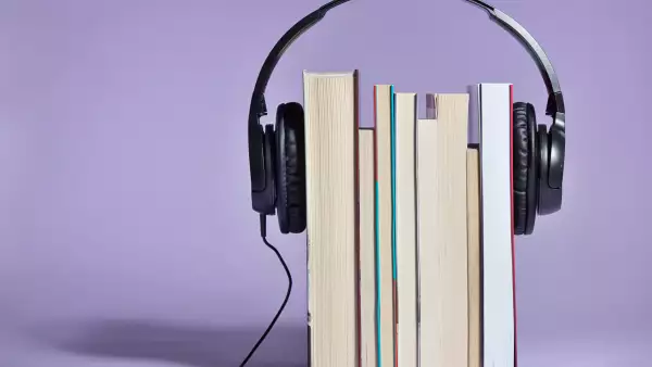 Audio books concept with books and headphones