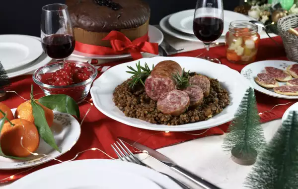 Italian Christmas food. Cotechino with lentils.