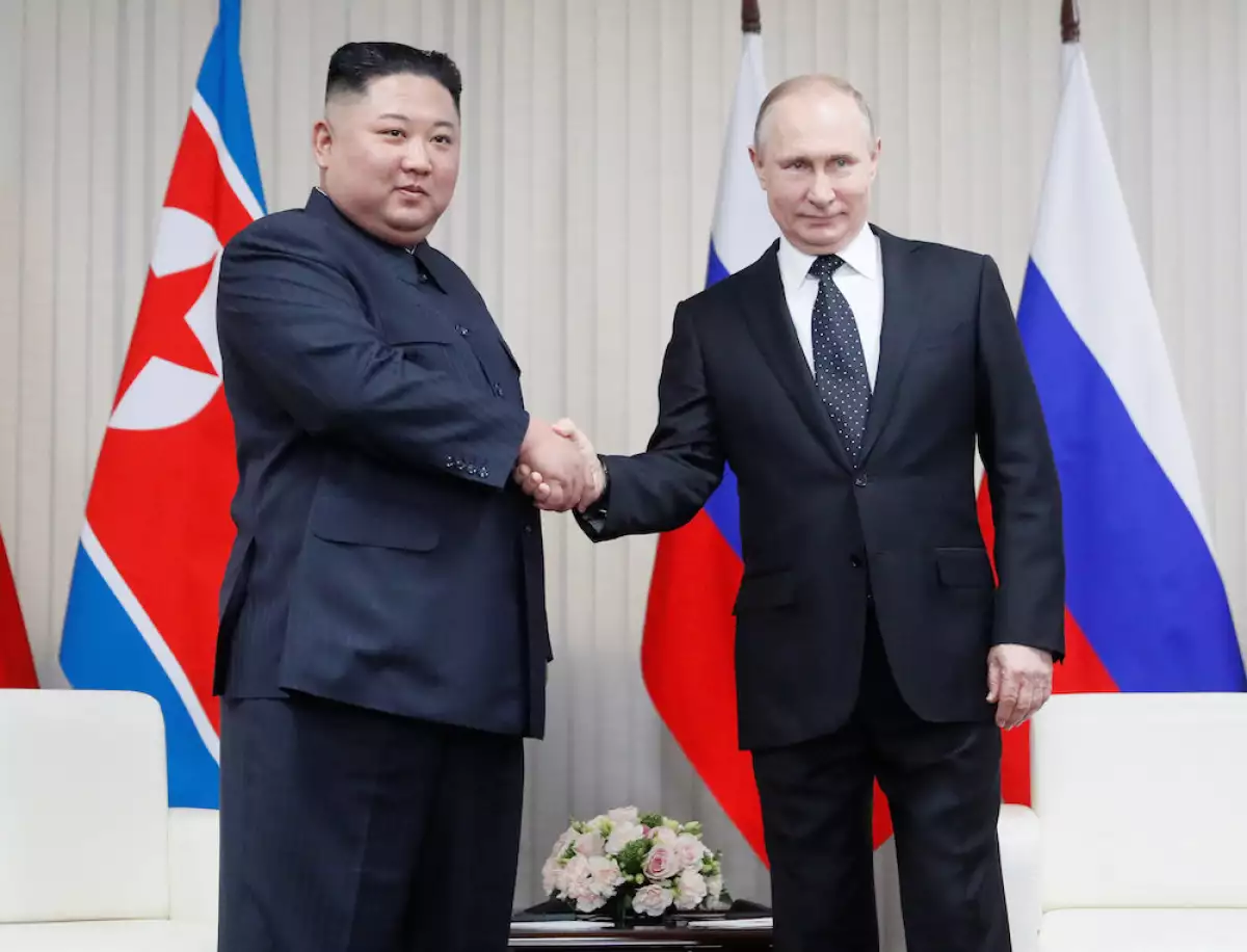 Vladimir Putin y Kim Jong Un