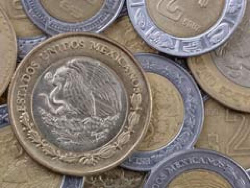 El tipo de cambio cerró la jornada de este martes con ganancias frente al peso. (Archivo)