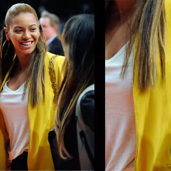 Beyonce eligió  un blazer amarillo para un look casual con blanco y negro.