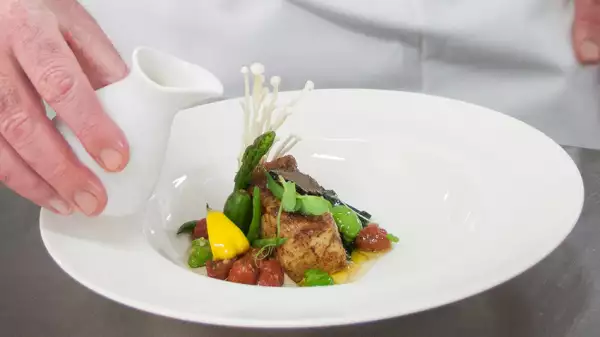 Pescado en jugo de vegetales.