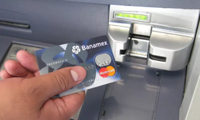 Banamex, BBVA Bancomer y Santandes, entre las financieras afectadas por la rebaja de la calificadora. (Foto: CNNExpansión)
