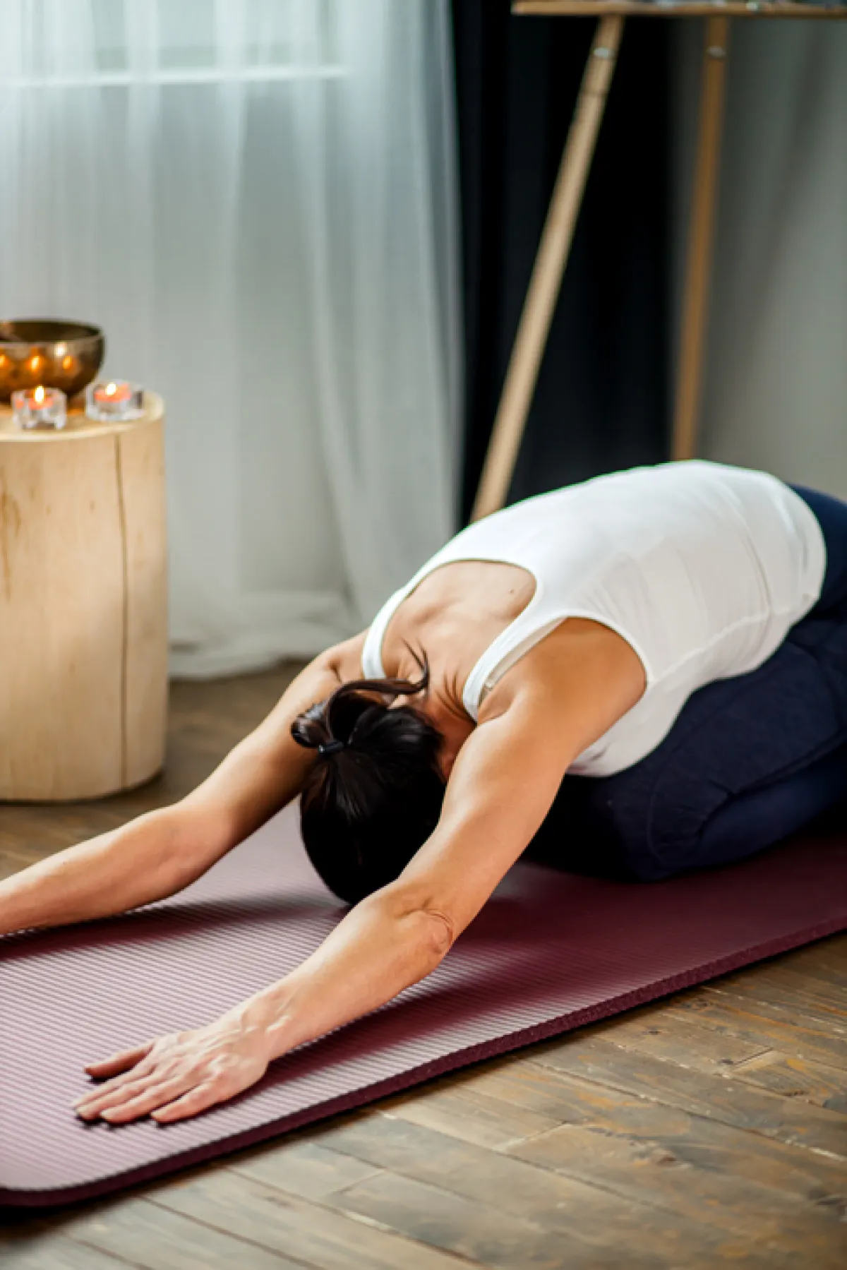 flexible female yogi stretching