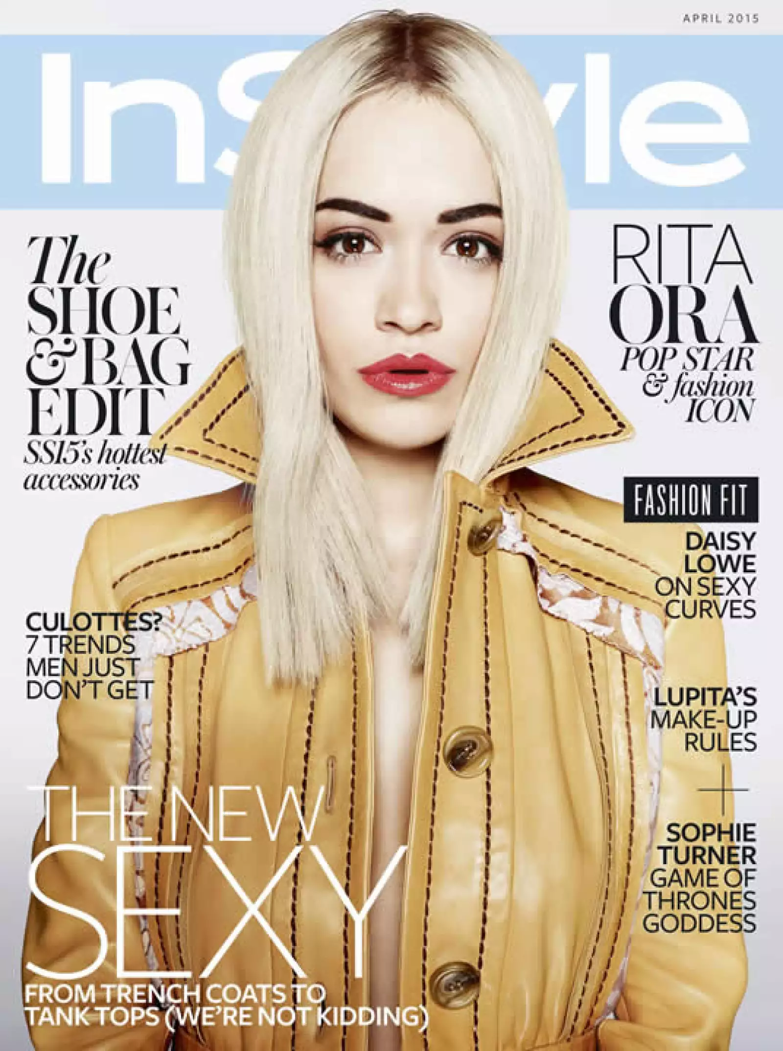 Para InStyle UK, Rita Ora fue fotografiada por Marcin Tyszka. Aparece con labios rojos y brillantes, cejas gruesas y una trenchcoat de piel amarilla de Prada, colección primavera verano 2015.