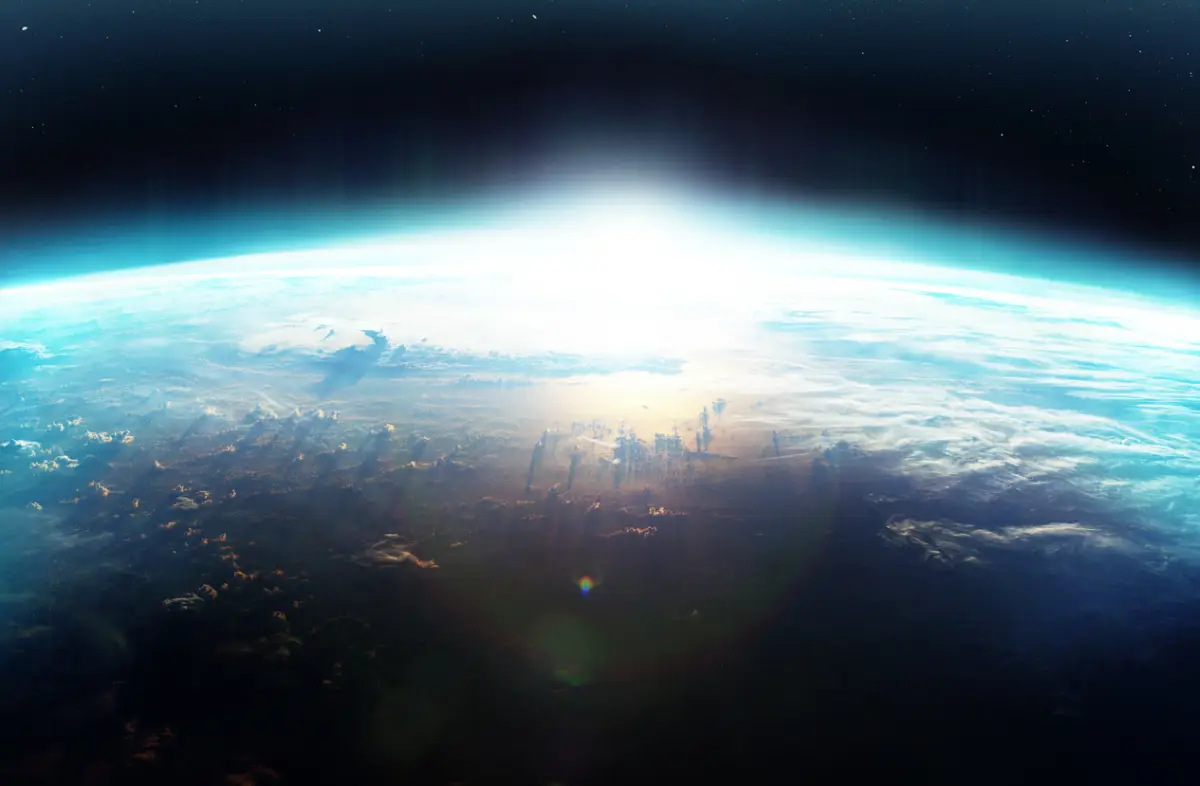 Foto de el planeta Tierra visto desde el límite con el espacio exterior.