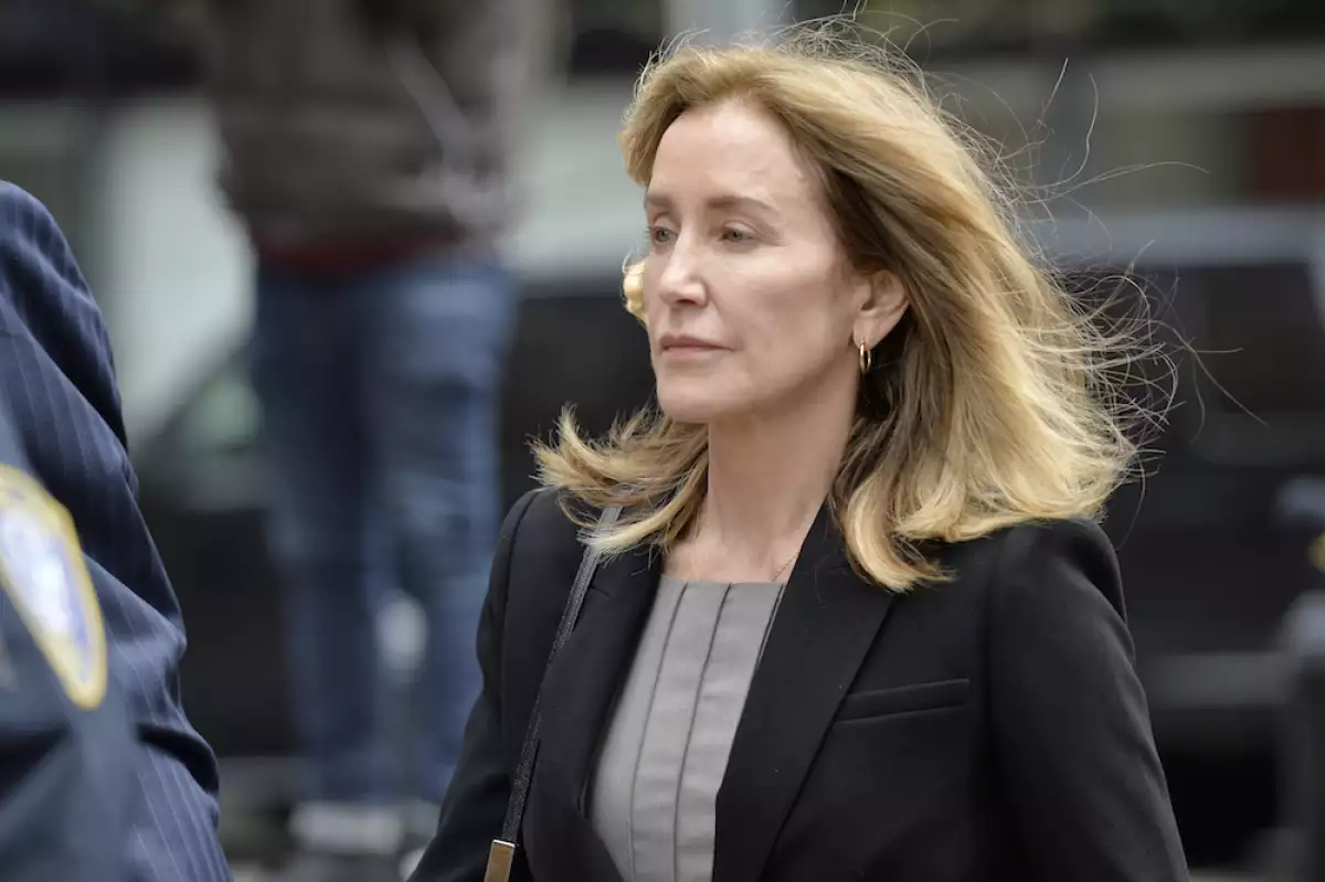 Felicity Huffman expected to plead guilty to using bribery to get daughter into university