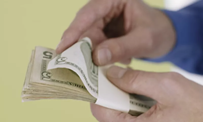 El tipo de cambio podría oscilar entre 12.62 y 12.69 pesos por dólar este jueves, estima Banco Base.  (Foto: Getty Images)