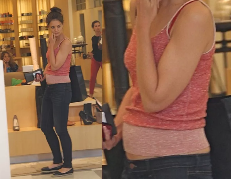 Una revista estadounidense confirmó en su portada que la esposa de Tom Cruise espera su segundo hijo, luego de que unas fotos dejaran entre ver esa posibilidad.