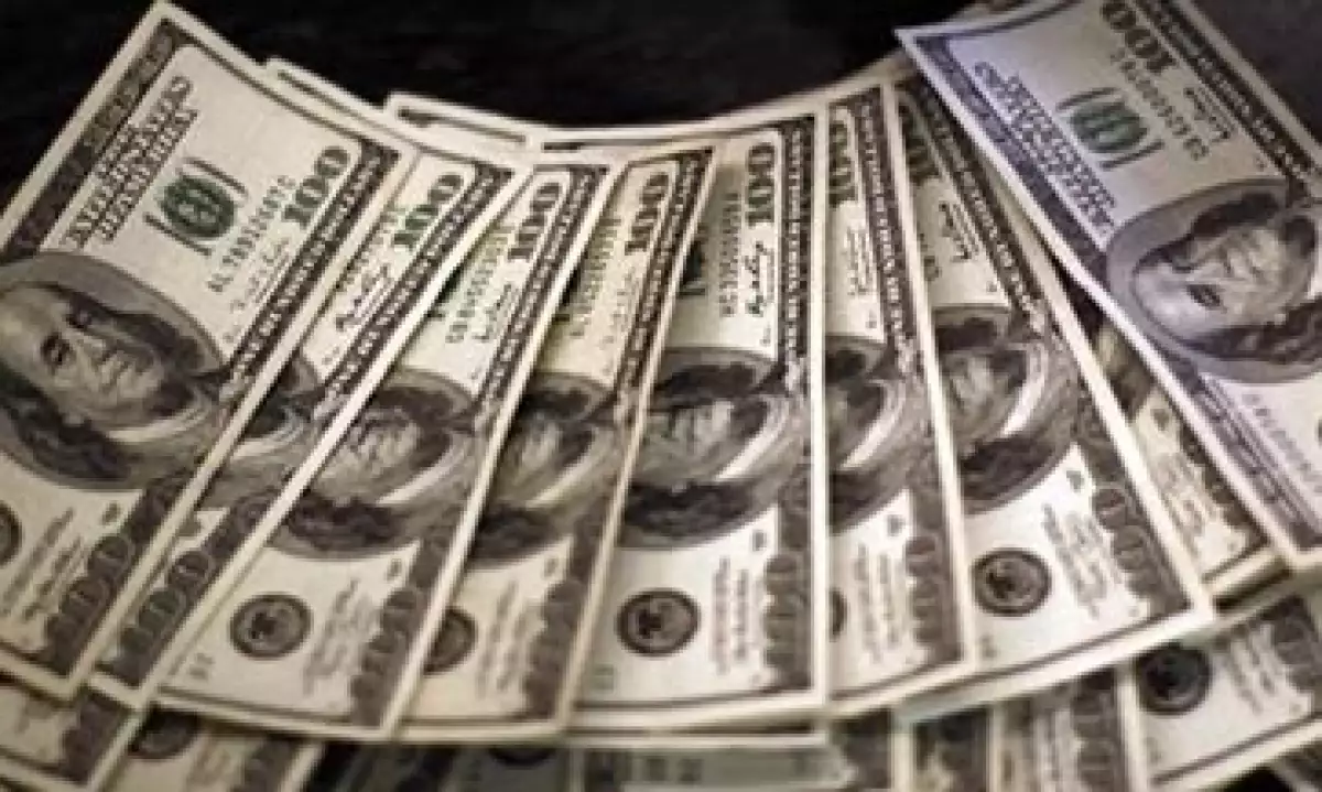El tipo de cambio oscilará entre 12.35 y 12.45 pesos por dólar, estima Banco Base. (Foto: Reuters)