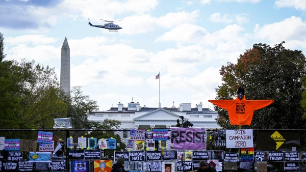 Helicopter passes over the White House the day before the U.S. presidential election in Washington