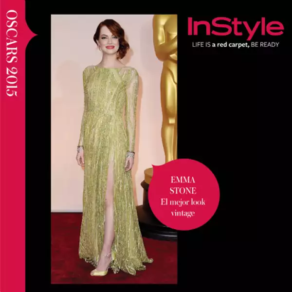 Con un aire setentero Emma luce sexy y refinada con este diseño dorado de Elie Saab.