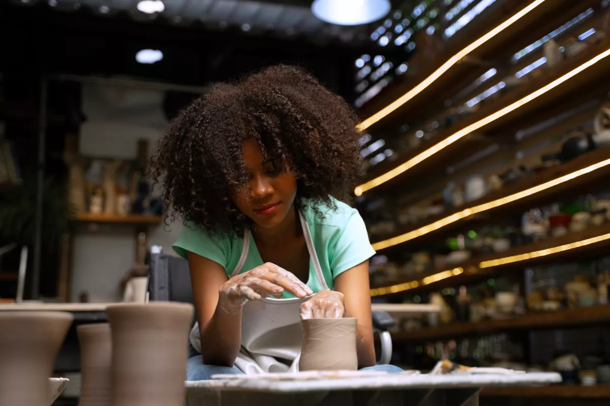 African,Woman,Make,Earth,Ware,At,Workshop.,Small,Business,,Hobbies.