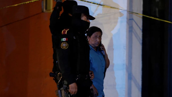 Dolores Bazaldua, mother of 18-year old missing student Debanhi Escobar, leaves the Nueva Castilla motel after authorities found the body of a woman in a water tank, which she says belongs to her daughter, in Escobedo