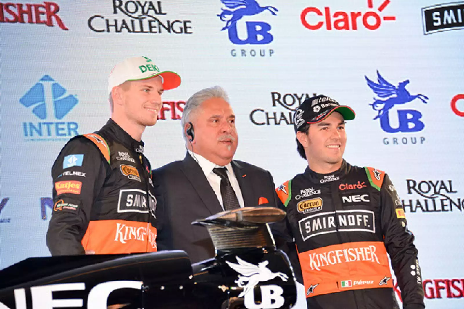 Checo Pérez,Vijay Mallya y Nico Hulkenberg.