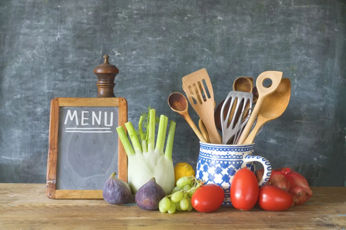 fruits and vegetables with kitchen utensils