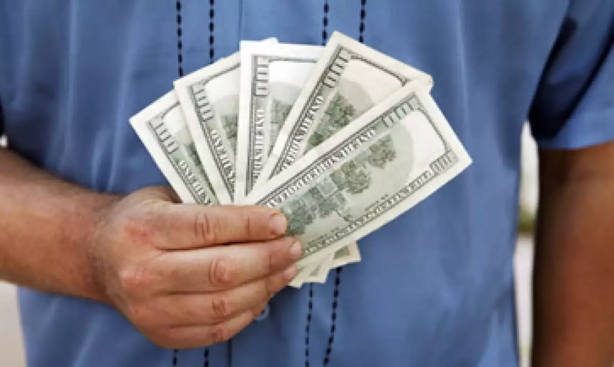 El tipo de cambio podría ubicarse entre 12.91 y 13.01 pesos por dólar, estima Banco Base. (Foto: Getty Images)