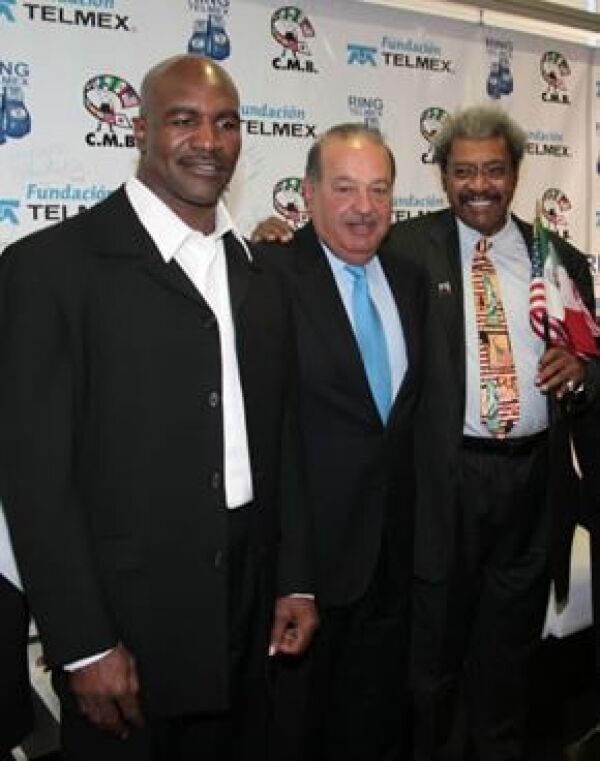 Evander Holyfield, Carlos Slim y Don King.