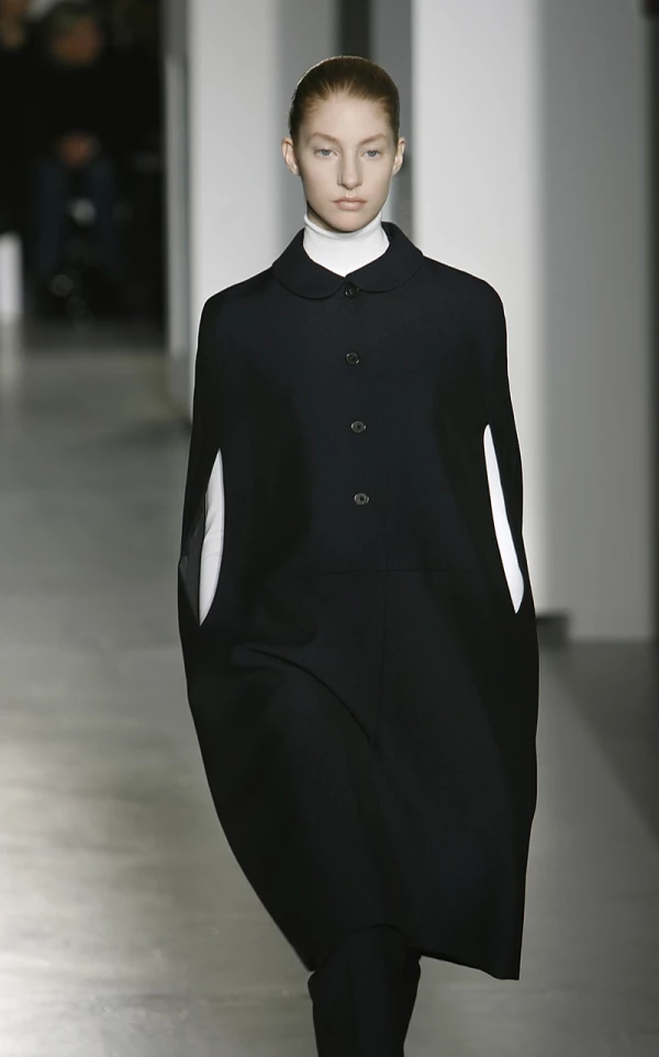 MILAN ? FEBRUARY 20: Models walk down the catwalk during the Jill Sander by Raf Simons' Autumn/Wint