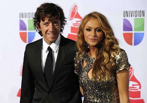 Colate y Paulina Rubio.