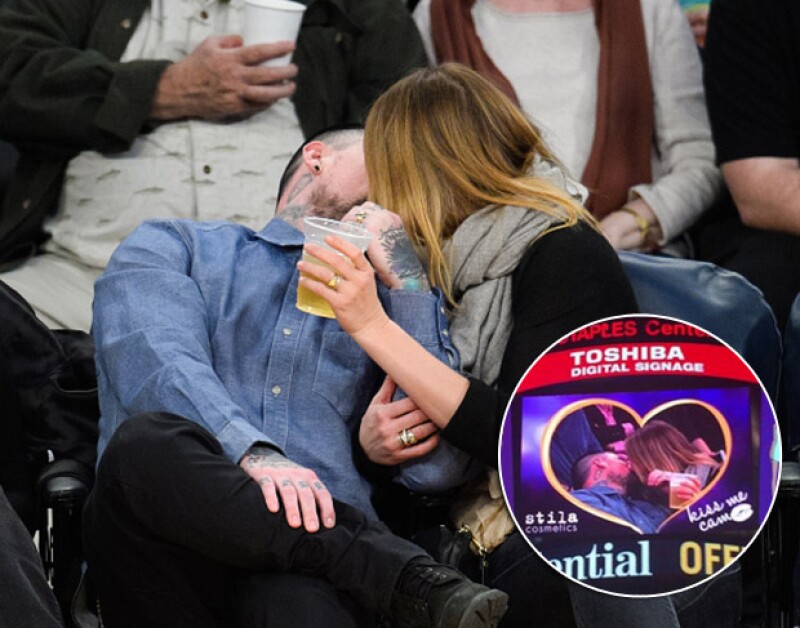 En su primera aparición pública tras su boda, la actriz y Benji Madden fueron sorprendidos por la cámara romántica, durante un partido de los Lakers, de la que no pudieron escapar.