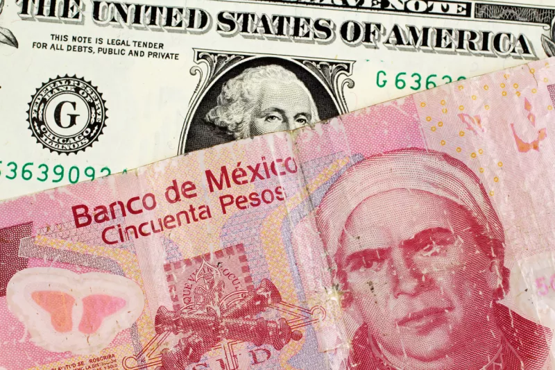 Mexican 50 Peso Note With An American One Dollar Bill