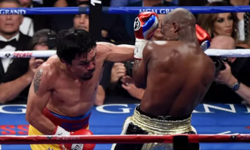 El estadounidense Mayweather se llevó el triunfo el 2 de mayo. (Foto: AFP )