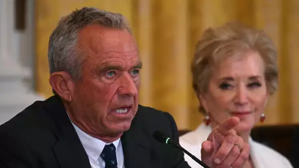 US Secretary of Health and Human Services Robert F. Kennedy Jr. (L) gestures as he speaks as US Secretary of Education Linda McMahon looks on during a MAHA (Make America Healthy Again) Commission Event in the White House in Washington, DC, on May 22, 2025.