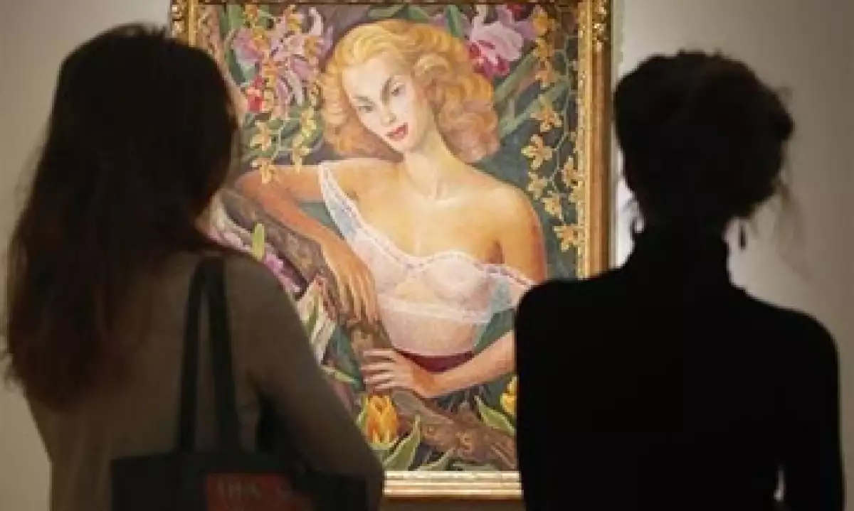 La obra subastada muestra a la actriz mexicana Linda Christian con un top translúcido y envuelta en tulipanes y orquídeas. (Foto: Reuters)