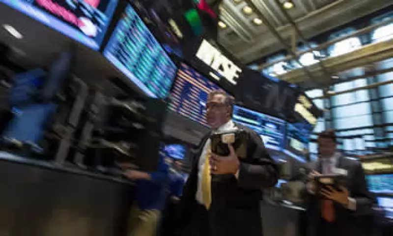 Los mercados en EU están atentos al posible anuncio del término del programa de estímulos de la Fed. (Foto: Reuters )