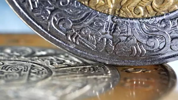 macro of mexican coins with a selective focus
