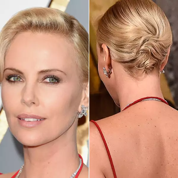 Como era de esperarse, Charlize Theron lució espectacular en la alfombra roja. Llevó un mini low bun con ondas a los lados, dándole un toque vintage, y un beauty look natural y nude.