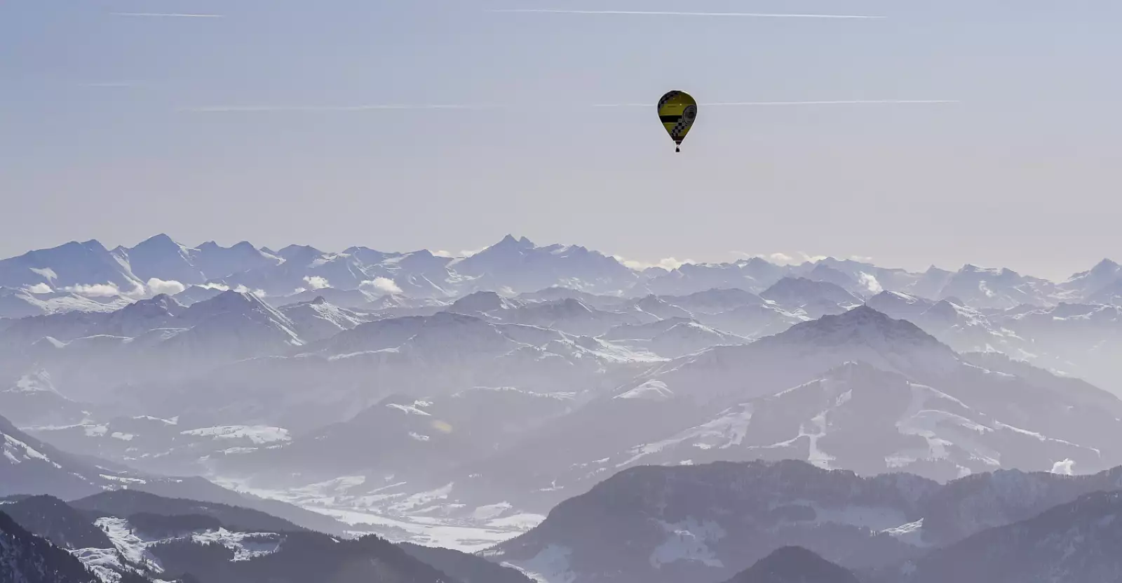 A balloon is in the air during a joint trip as part of the 19th Alpine Ballooning 2020 in the mountains near Kossen